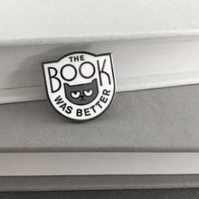 The black and white version of Rather Keen's The Book Was Better enamel pin