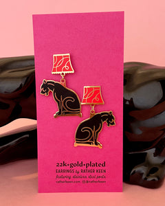 Panther lamp statement earrings on display card