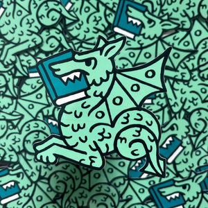 Illustrated dragon biting a book