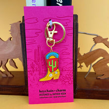 boot keychain on display card
