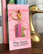 Duck bookend keychain on backing card