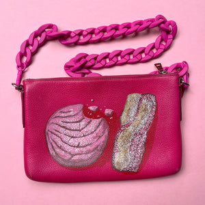 Pink pan dulce painted on pink Coach bag 