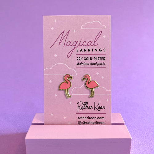 Pink flamingo stud earrings on their display card