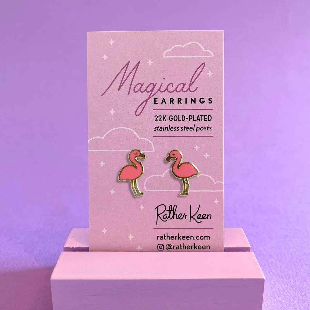 Pink flamingo stud earrings on their display card