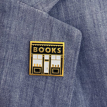 A book shop enamel pin by Rather Keen