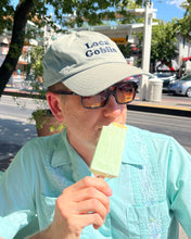 Andrew wearing the Rather Keen Local Goblin dad hat
