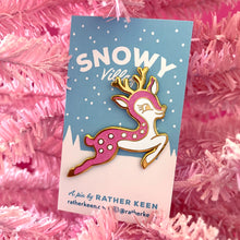 Pink mid-century style Christmas deer enamel pin on display card