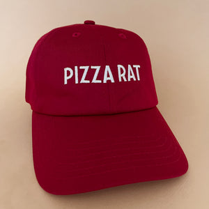 red dad hat with the words PIZZA RAT embroidered 