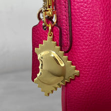 golden ravioli bag charm by Rather Keen