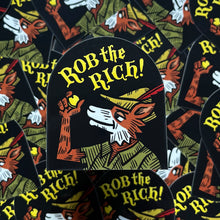 Sticker of Robin Hood fox declaring "Rob the Rich!"