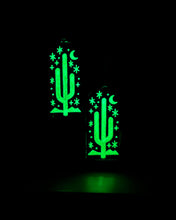 Desert Cactus earrings glowing in the dark