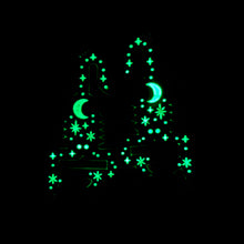 Scorpion earrings glowing in the dark