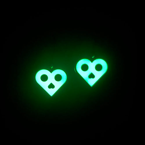 Glowing heart shape skull earrings