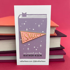 Read Smut lapel pin on Rather Keen display card