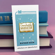Unreliable Narrator enamel pin on its display card