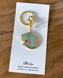 The dinosaur keychain shown on its display card