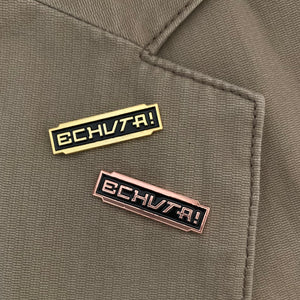 Star Wars inspired enamel pins worn on jacket lapel