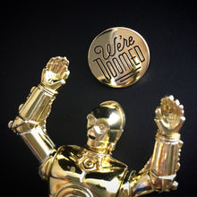 C-3PO action figure posed with We’re Doomed lapel pin