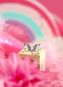 Unicorn stud earrings by Rather Keen.